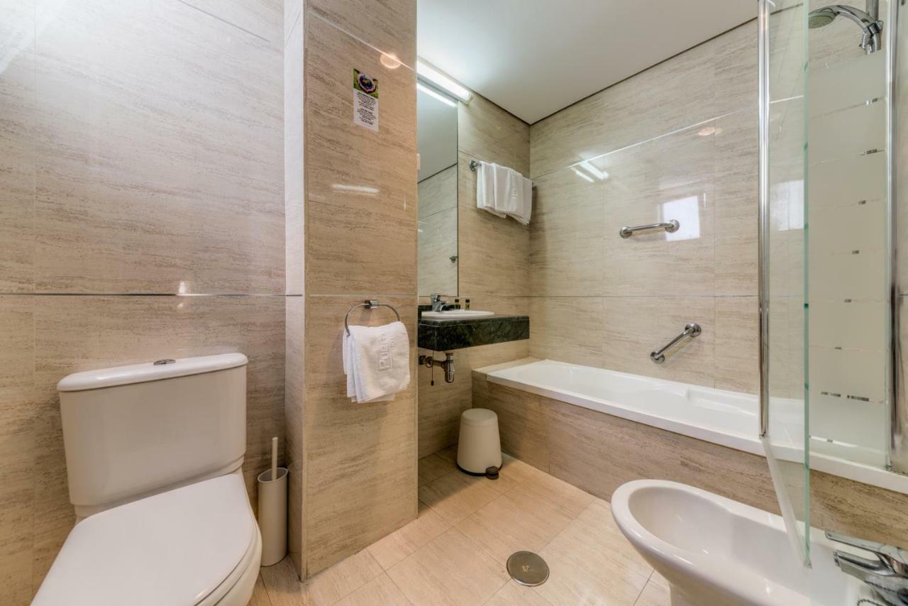 Habitación Cuádruple (3 adultos + 1 niño)